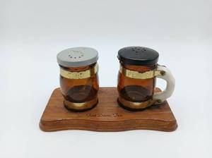 lot 237 image: Salt and Pepper Shaker Set Fort Davis Texas Wood Base