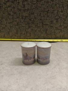 lot 244 image: Pair of Porcelain Salt and Pepper Shakers with Cowboy Scene