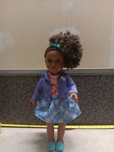 lot 267 image: 18-Inch Doll with Curly Hair Purple Jacket Plaid Skirt