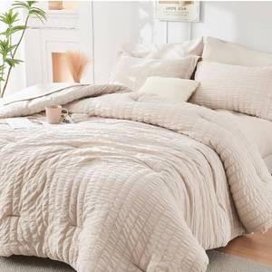 lot 152249 image: HYMOKEGE Beige Oversized King Comforter Set Seersucker 7 Pieces, All Season Luxury Bed in a Bag for Bedroom, Bedding Set with Comforter, Sheets, Pillowcases & Shams