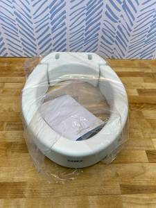 lot 461484 image: Carex Toilet Seat Riser, Elongated Raised Toilet Seat Adds 3.5 inches to Toilet Height, for Assistance Bending or Sitting, 300 Pound Weight Capacity Toilet Riser