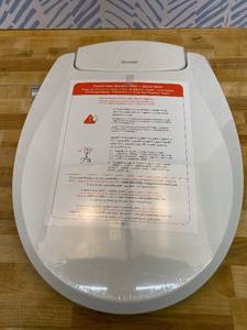 lot 461495 image: Brondell Bidet Toilet Seat Non-Electric Swash Seat, Fits Round Toilets, White   Dual Nozzle System, Ambient Water Temperature   Bidet with Easy Installation