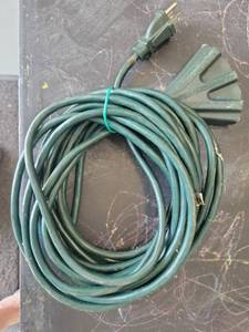 lot 8 image: Green Extension Cord with Multiple Outlet Plug Ends - Retail $0