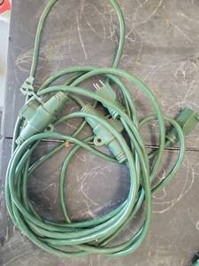 lot 10 image: Green Power Strip Extension Cord with Multiple Outlets - Retail $0