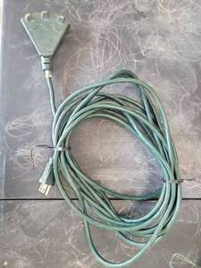 lot 11 image: Green Extension Cord with Multi-Outlet Plug Head - Retail $0