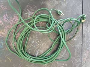 lot 12 image: Green Outdoor Extension Cord with 3-Prong Plug - Retail $0