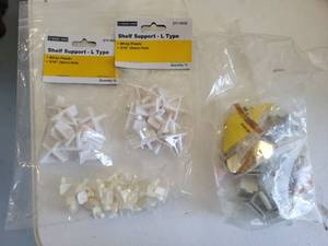 lot 24 image: Storage Shop Shelf Support L Type White Plastic 316 Hole 211-5032 - Retail $0