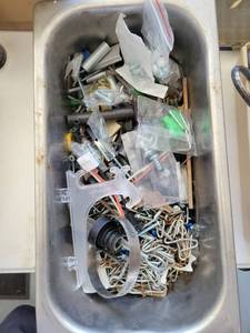 lot 30 image: Bin of Assorted Hardware Fasteners Bolts Screws Springs and Parts - Retail $0
