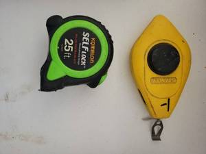 lot 31 image: Komelon 25 ft Self-Lock Tape Measure and Stanley Chalk Line Reel Lot - Retail $0