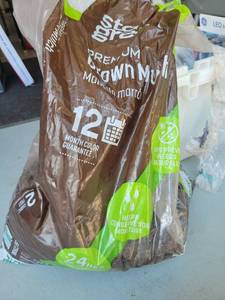 lot 50 image: 14 bag of brown mulch - Retail $0