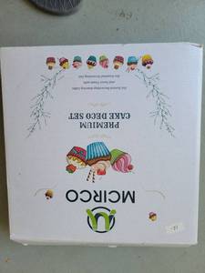 lot 96 image: Wilton Complete Cake Decorating Supplies Set - Retail $0