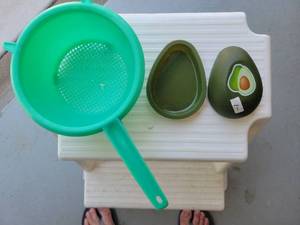 lot 102 image: Kitchen Gadget Lot Colander Avocado Container 2 Piece Set - Retail $0