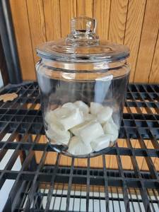 lot 109 image: Glass Apothecary Jar with Lid with cleaning pods - Retail $0