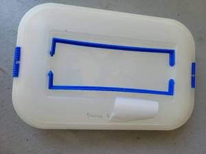 lot 114 image: White Plastic casserole dish with Blue Handles - Retail $0