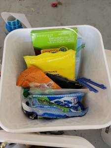 lot 142 image: Cleaning Supplies Lot in Bin �� Clorox, Mr. Clean, Swiffer Refill Kit, disposal mask, gloves - Retail $0