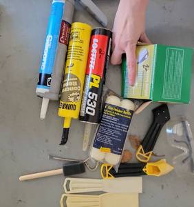 lot 149 image: Paint and Finishing Tool Set with Caulk, Brushes, and Applicators - Retail $0