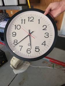 lot 168 image: Quartz Wall Clock with Black Frame White Face 12 Inch - Retail $0