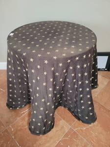 lot 205 image: 30x30 Round Table with Star Pattern cloth Black and Gold, Approximately 30Lx30H