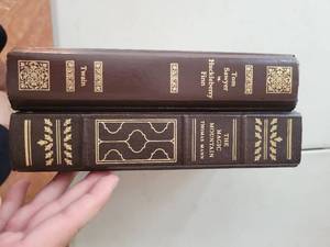 lot 211 image: Two- Book Set Tom Sawyer & Huckleberry Finn with Decorative Binding and the Magic Mountain