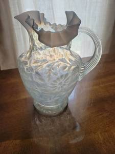 lot 230 image: Glass Pitcher with Embossed Leaf Design and Ruffled Rim over $200