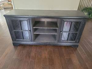 lot 265 image: Black Sideboard Cabinetentertainment center with Glass Doors and Shelving 66Lx20Wx32.5H. VERY Heavy