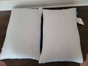 lot 275 image: Bed Pillows with Blue Trim Set of 2 made from cut up memory foam