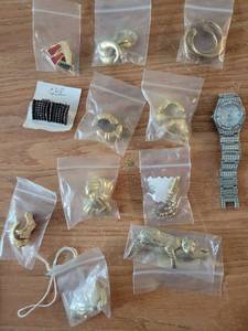 lot 304 image: Various Earrings and a leopard pin and watch