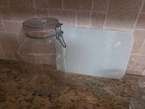 lot 411 image: Glass Jar Glass Cutting Board