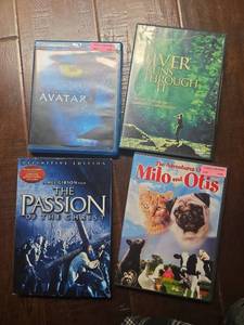 lot 441 image: Lot of 4 DVDsBlu-ray Avatar, A River Runs Through It, The Passion of the Christ, Milo and Otis