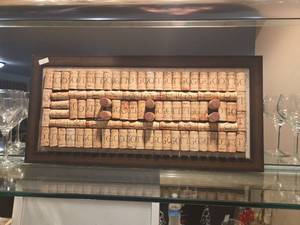 lot 480 image: Wine Cork Wall Art Framed Display with Wooden Rod Accent