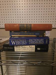 lot 525 image: Lot of 4 Books Poems, Child of the Holy Grail, Websters Dictionary, Both Sides of Nice