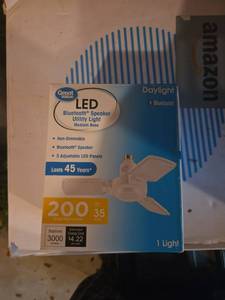 lot 579 image: Great Value LED Bluetooth Speaker Utility Light Medium Base 200W Equivalent 35W