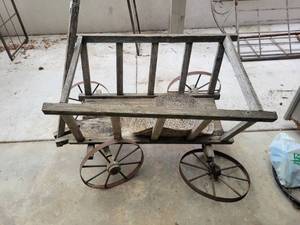 lot 615 image: Farm Wagon with Wood Bed and Metal Wheels broken wheel