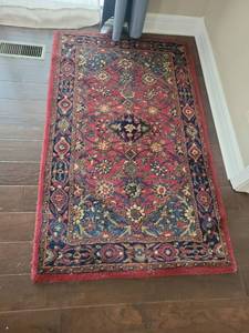 lot 642 image: Red Floral Patterned Area Rug with Navy and Gold Accents 59x36