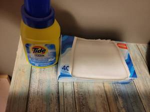 lot 643 image: Tide Simply Clean Fresh Laundry Detergent 10 FL OZ and Dryer Sheets 40 Count Lot half gone