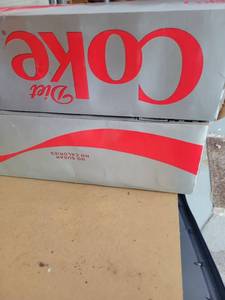 lot 655 image: 2 12 packs of diet coke . Total probably 20 cans