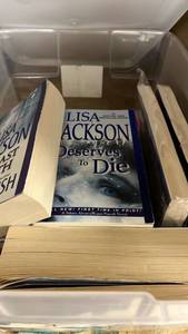 lot 13 image: Lot of 9 Books - includes Lisa Jackson, Ryan Holiday, Chuck Palahniuk