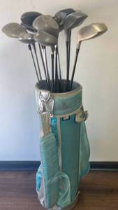 lot 23 image: Golf Club Set with Teal Carry Bag