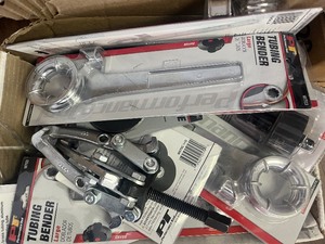 lot 100 image: Mystery Tools Box - 20 items includes tubing bender, aluminum oxide disks pulley puller