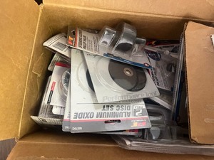 lot 101 image: Mystery Tools Box - 20 items includes tubing bender, aluminum oxide disks pulley puller