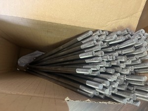 lot 112 image: Stainless steel rod threaded on both ends double end stud approx 15 inch long