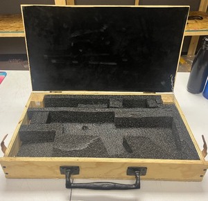 lot 116 image: Wood boxcase with foam inside outside measures 23x13.5x3 inches inside measures 10.5x22x1.5 inches