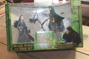 lot 3060 image: NIB Lord of the Rings Arwen & Asfaloth Dolls