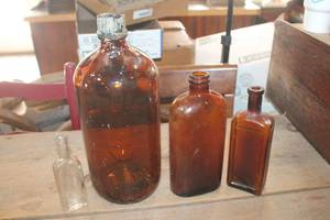 lot 3063 image: Lg. 14 Tall Amber Glass Bottle and More
