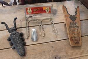 lot 3243 image: Vintage Cast Iron Boot Puller and More