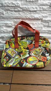 lot 6 image: Colorful Handbag w Stamps from around the World