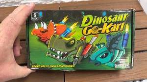 lot 12 image: Giganotosaurus Speed Dinosaur Pack 6 Pullback Racers