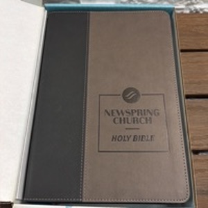 lot 17 image: Holy Bible Large Print Slimline Edition New Living Translation with Newspring Church Notebook