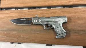lot 74 image: Xtreme-Tac Folding Knife with Pistol Handle