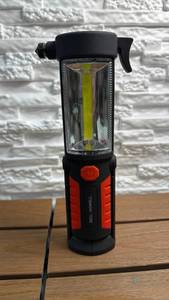 lot 129 image: Bell  Howell Torchlite with Hammer & Seatbelt Cutter
